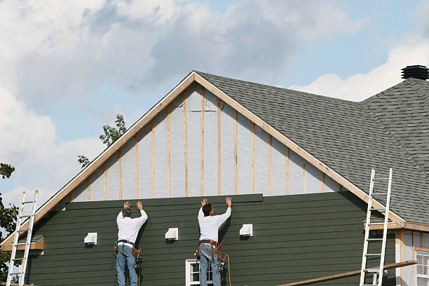 Professional Emergency Siding Repair technician working in Sidney, OH